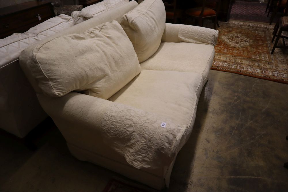 A contemporary cream brocade upholstered two seater settee, width 170cm depth 92cm height 86cm